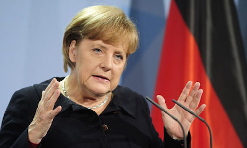 German Chancellor Angela Merkel describes the ideal bratwurst.